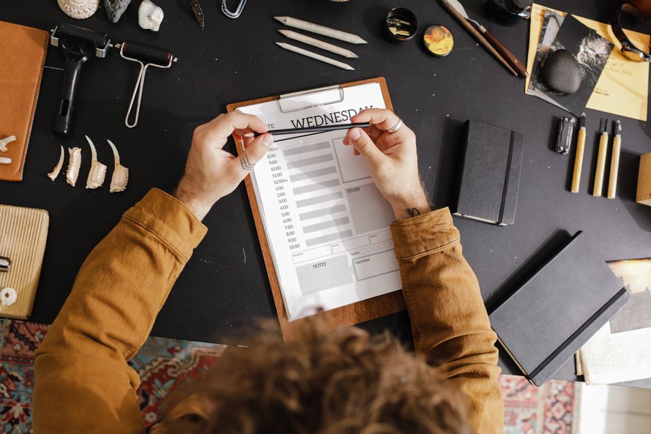 Dedicated wedding planner organizing details with a clipboard